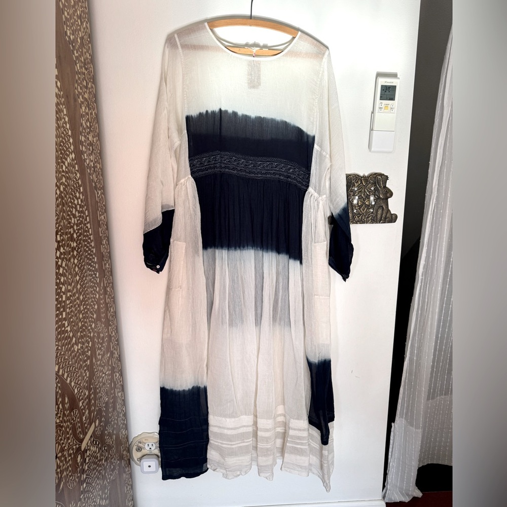 Beautiful brand new dress by Injiri. Size small.